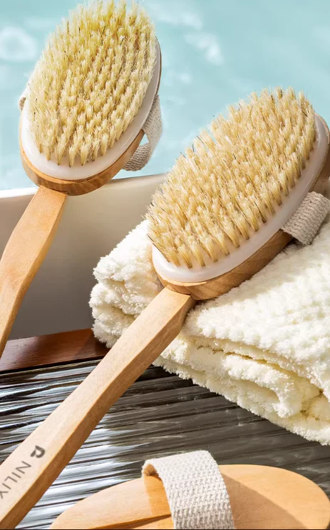 Cepillo manual de ropa portátil