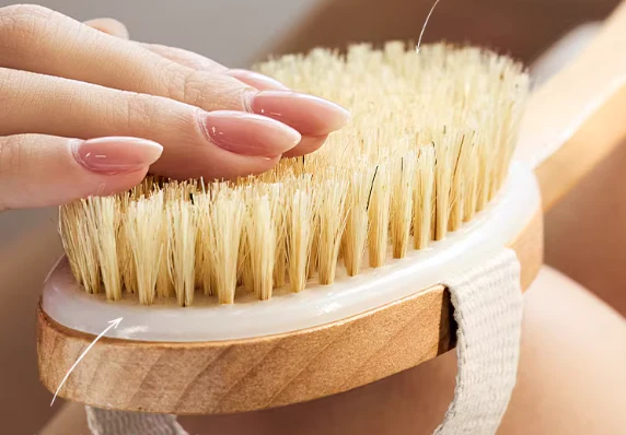 Cepillo manual de ropa portátil